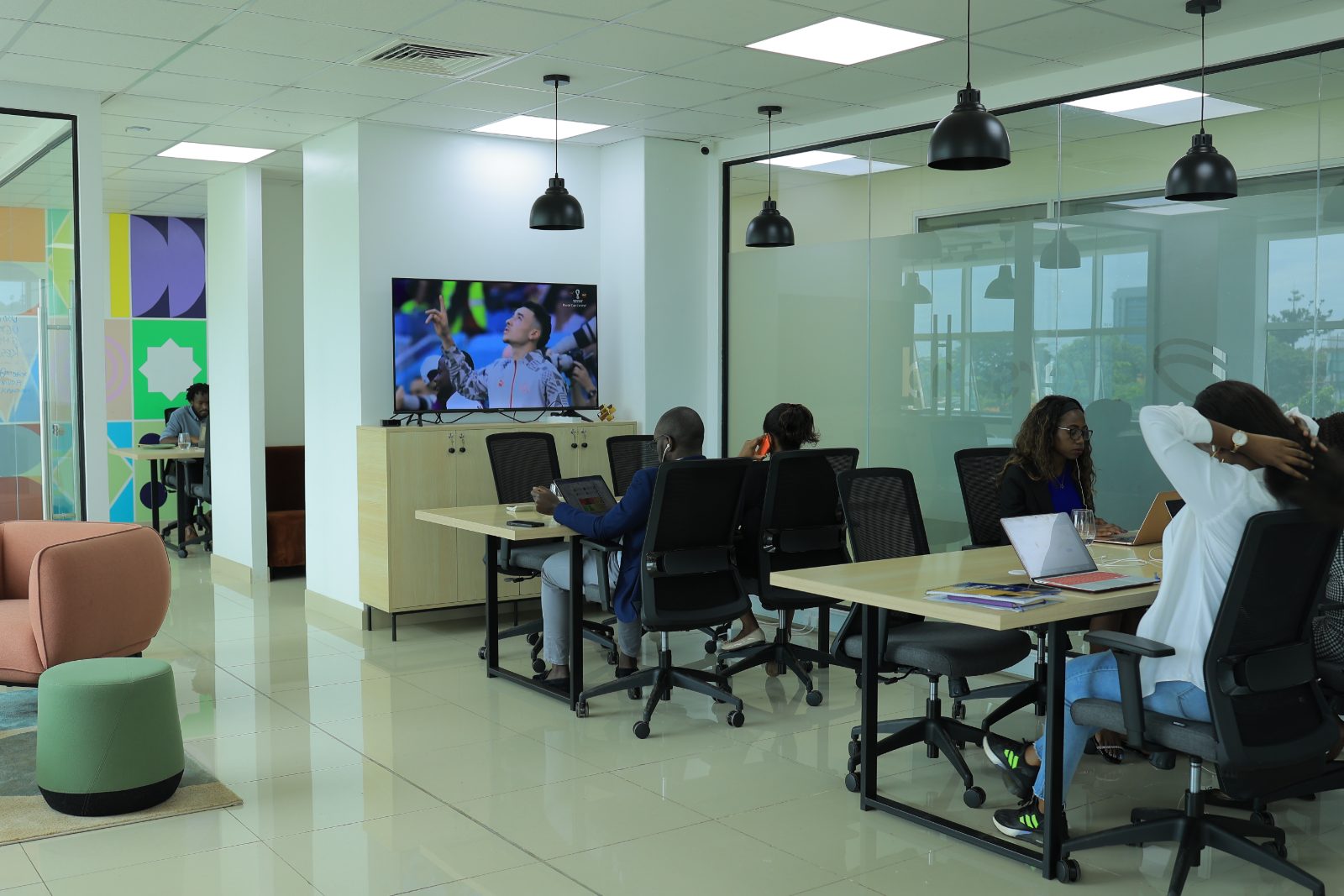 The Eversend team at work in the Kampala office